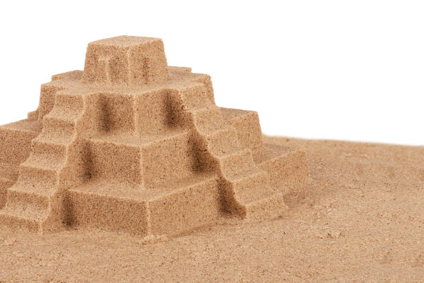 istock Close up on a sand castle on the beach, isolated on white background. 1094248390