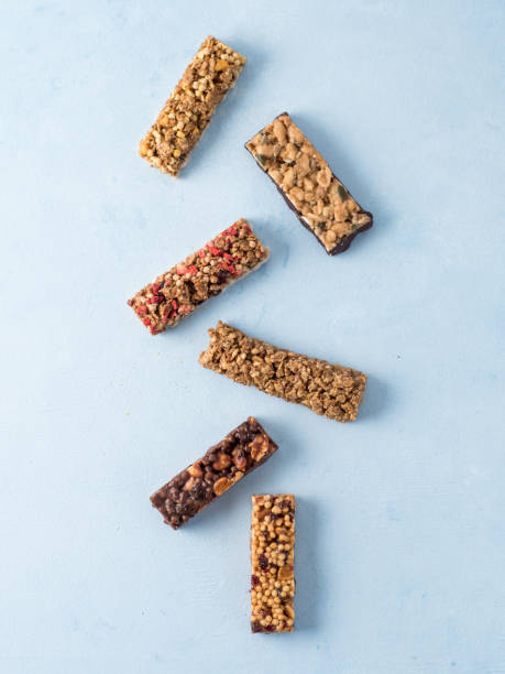 istock Set of different granola bars on blue background 1094252254