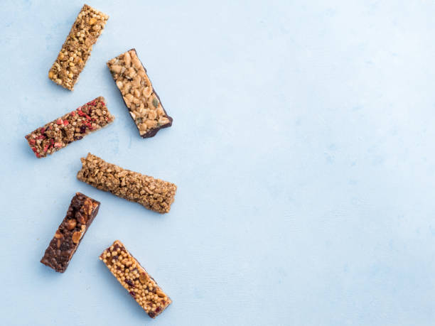istock Set of different granola bars on blue background 1094252260