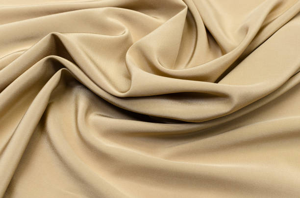 istock Silk fabric, beige chinese crepe 1094255530