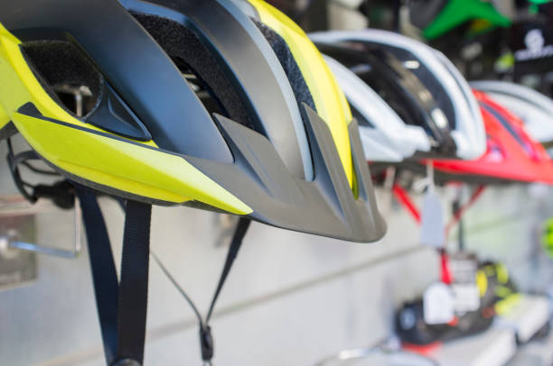 New bike helmets displayed on shop