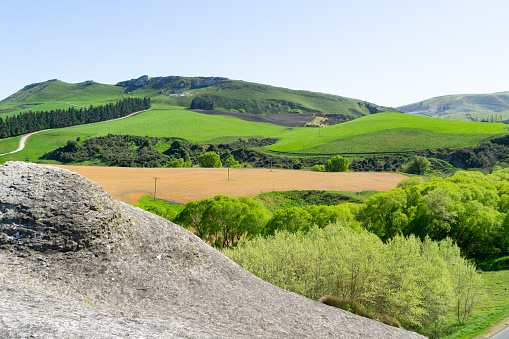 View from Rock bluff known as Frog Rock across farmland of Waipara Valley, Canterbury New Zealand