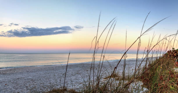 istock Sunrise over North Gulf Shore Beach 1094260280