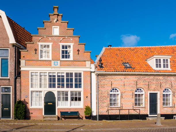 Front of old merchant's house with stepped gable in downtown Enkhuizen, Noord-Holland, Netherlands Front of historic merchant's house with stepped gable in downtown Enkhuizen, Noord-Holland, Netherlands enkhuizen stock pictures, royalty-free photos & images