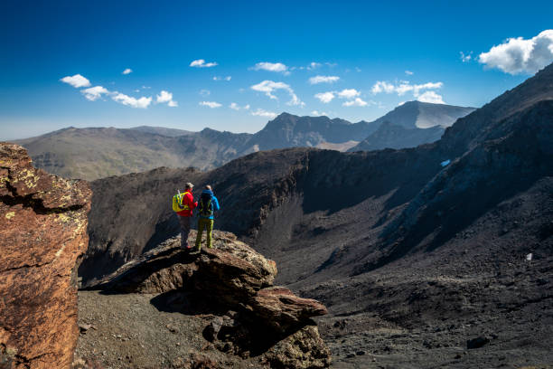 istock Anonymous men admiring view of mountains 1094261816