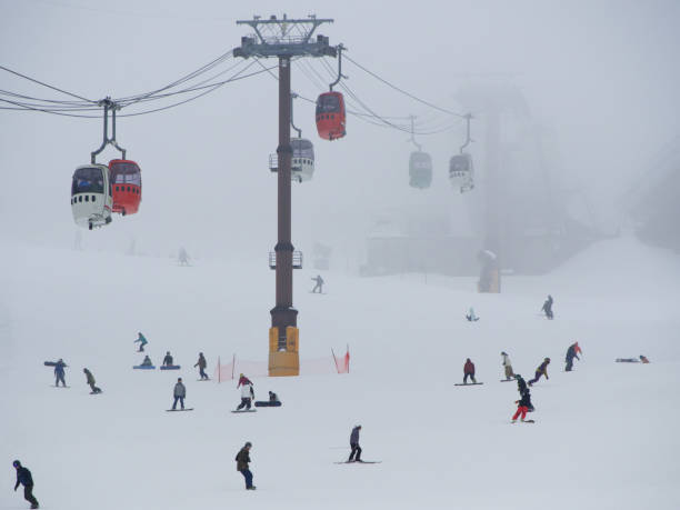 Cable car This photo is in the mountain snow park of Japan. japanese snowboarder stock pictures, royalty-free photos & images