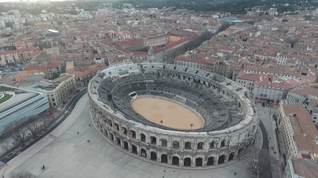 Flying over the old Roman amphitheatre in the city of Nimes