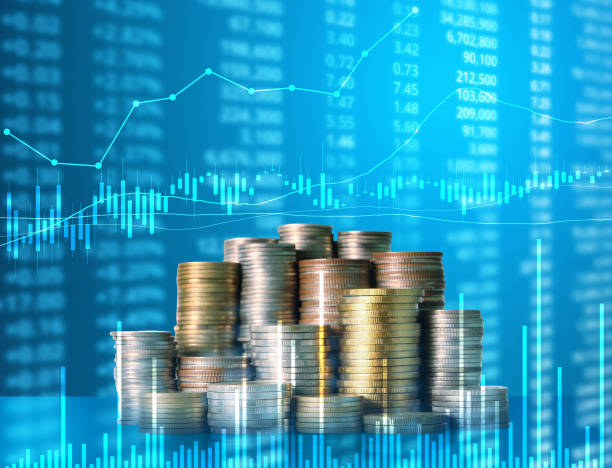 istock Coins graph stock market 1094281460