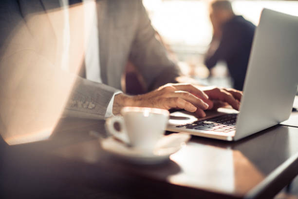 istock Business Man in a Cafe 1094299286