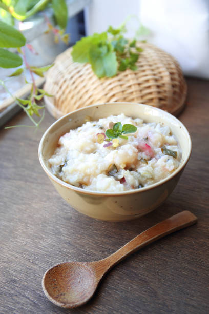 istock japanese rice congee with herbs and green vegetables 1094300334