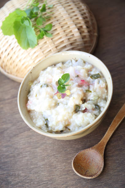 istock japanese rice congee with herbs and green vegetables 1094300412