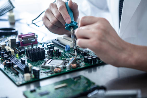 istock Researchers who repairs electronic parts. 1094303346