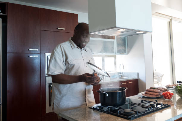 istock African man prepares lunch 1094304894