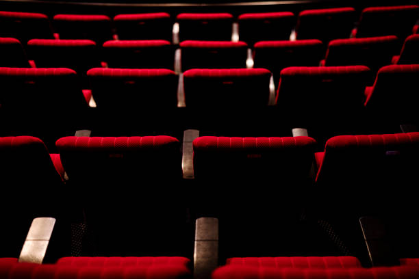 istock Rows of red seats in a theater 1094312420