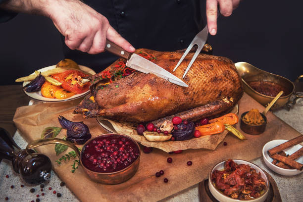 istock Roasted goose with herbs berries and vegetables 1094317930