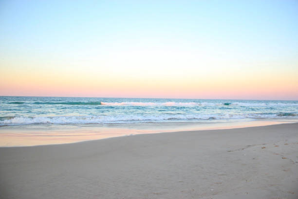 sea horizon ocean tropical summer pink sky - southern usa sand textured photography imagens e fotografias de stock