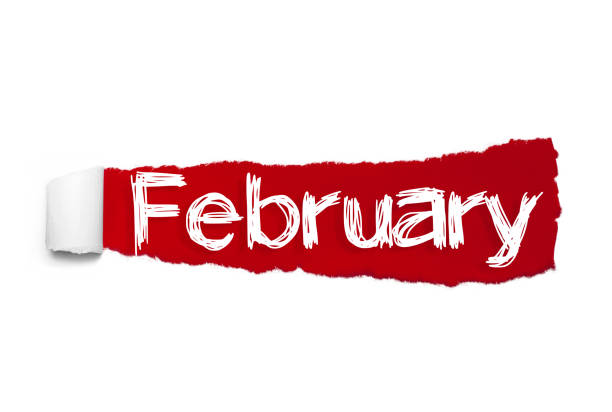 istock The word February appearing behind red torn paper 1094318410
