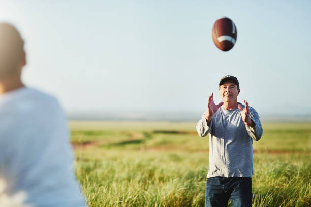istock Football is something they really bond over 1094320448