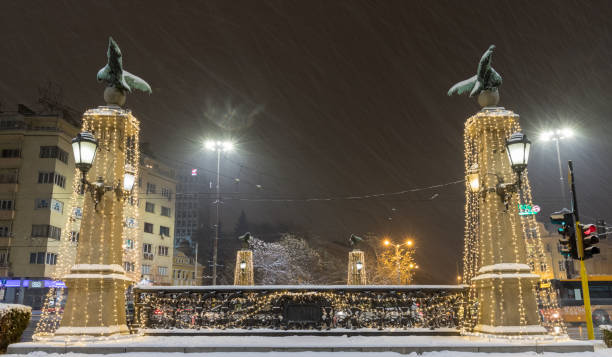 Sofia at winter night: Eagle bridge (Orlov most) and Tsarigradsko shosse boulevard stock photo