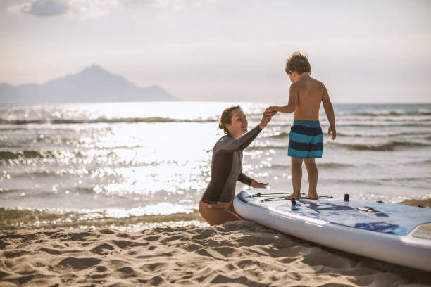 istock Mother and son on a paddle board 1094330000