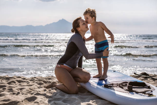 istock Mother and son on a paddle board 1094330054