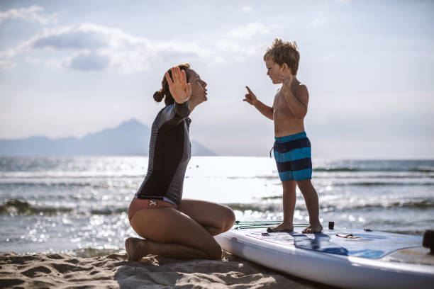 istock Surfing Lessons for my little one 1094330076