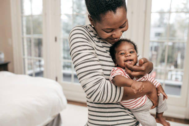 istock mom and newborn baby 1094334480