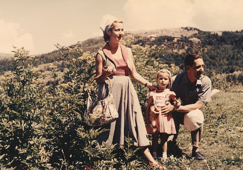 Happy family on vacation in mountain,1952 Dolomites alps