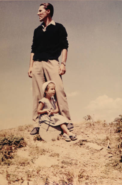 Father and daughter on vacation in mountain,1952 Dolomites alps 1952 Father and daughter on vacation in mountain dolomites photos stock pictures, royalty-free photos & images