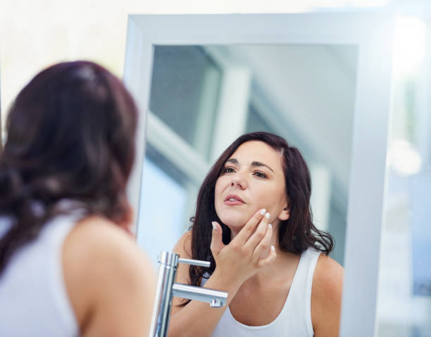 istock Giving her skin the once over 1094334816