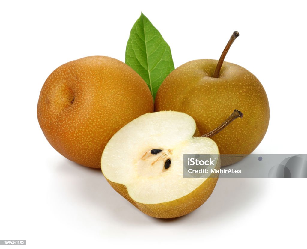 Asian pear or Nashi pear with leaf Asian pear or Nashi pear with leaf isolated on white background Asian Pear Stock Photo