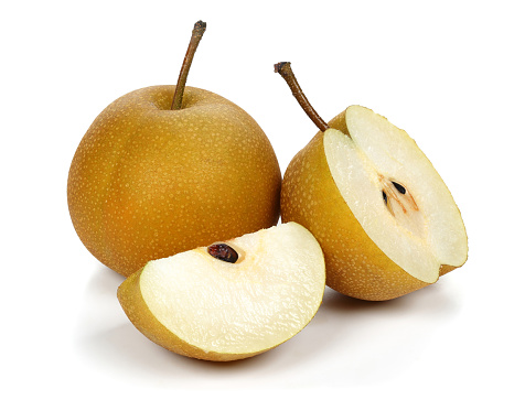 Fresh asian pear with leaf isolated on white background.