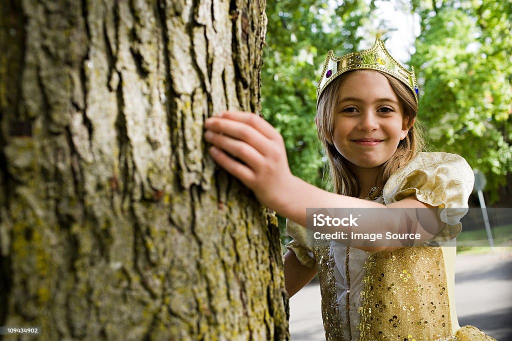 Girl wearing crown dressed up as queen  6-7 Years Stock Photo