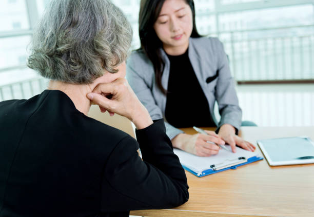 istock Two businesswomen working together in modern office 1094351586