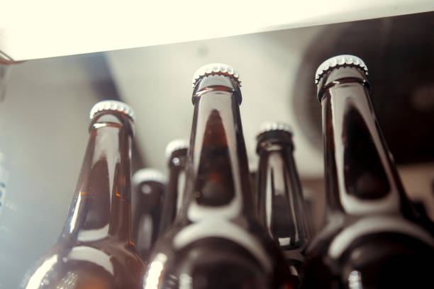 istock Bottles of beer in a fridge 1094357404