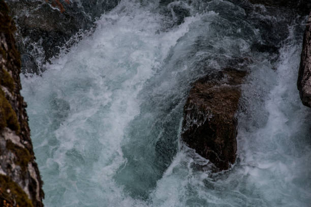 istock splash of water from waterfall 1094365096