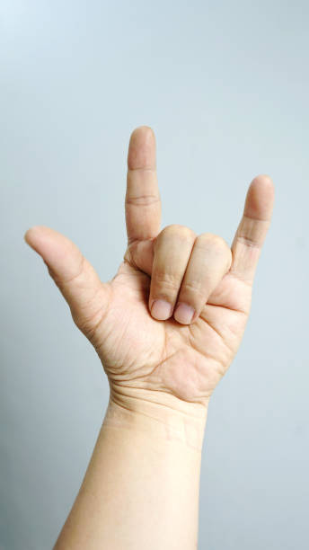 istock Love hand sign isolated on white 1094367314