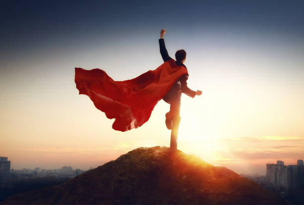 istock superhero businessman looking at city 1094376488