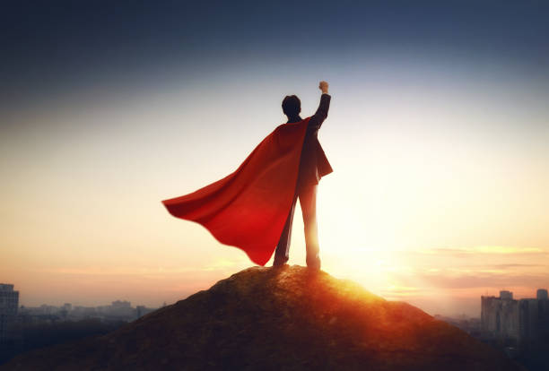 istock superhero businessman looking at city 1094376490