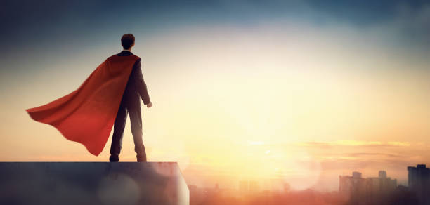 istock superhero businessman looking at city 1094376528