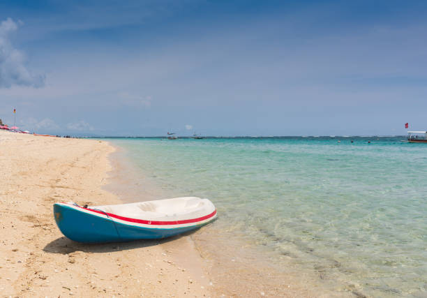 istock Kayak at the tropical beach at beautiful sunset. 1094376576