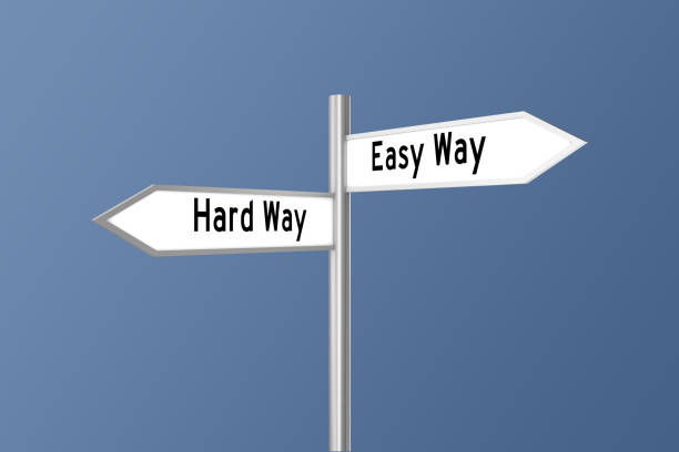 istock Easy hard way direction sign choice concept 1094381144