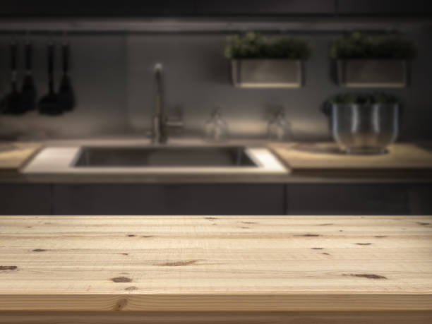 istock Kitchen island with wooden table top for product display montage. 1094383848