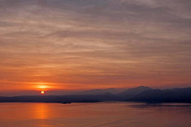 istock sunset on southern Lake Garda 1094389190