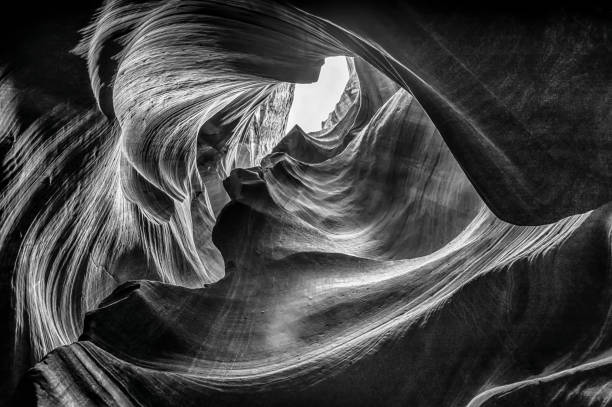 Upper Antelope Canyon in monochrome Beautiful view of amazing sandstone formations in famous Upper Antelope Canyon near the historic town of Page at Lake Powell, American Southwest, Arizona, USA - Stock image upper antelope canyon stock pictures, royalty-free photos & images