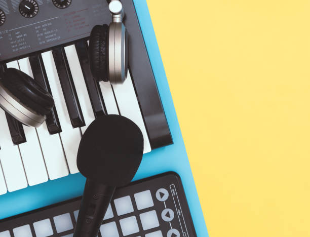 istock Music recording equipment on blue yellow copy space 1094392316