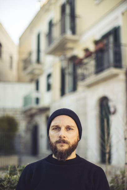 istock Man at bar, sitting outside. 1094396366