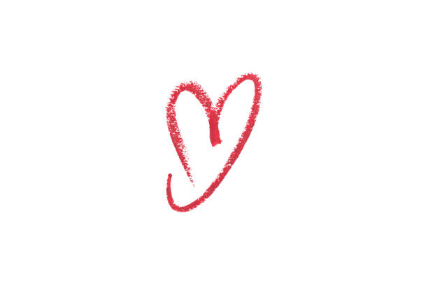 Heart drawn with color lipstick isolated on white. Love concept.