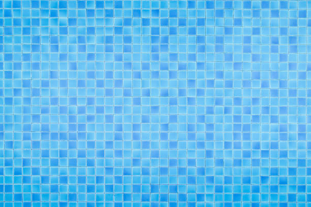 istock Top view swimming pool bottom caustics ripple and flow with waves background. Summer background. Texture of water surface. 1094397170