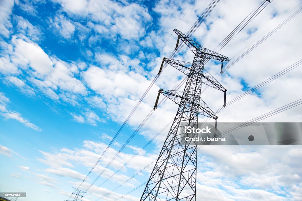 Electricity pylons with sky Electricity pylons under the blue sky Power Line Stock Photo